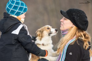 Ája, giving kisses to her breeder Alena